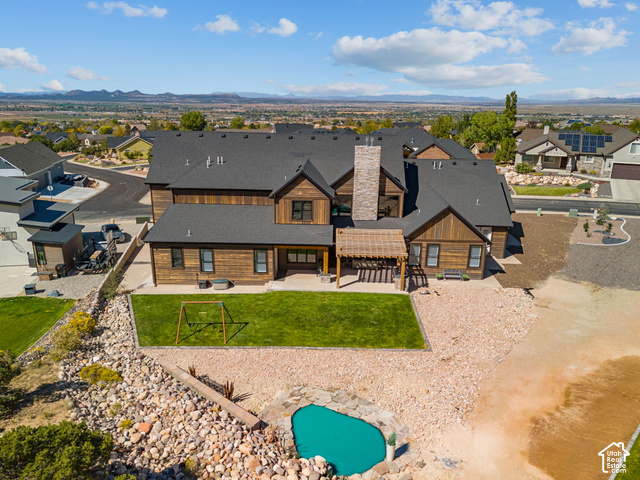 1192 East Ashdown Road Cedar City, UT 84721 - Photo 13 of 96 Wood-clad exterior with a dark shingle roof