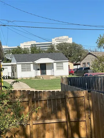 a front view of house with outdoor space