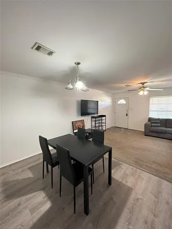 a view of a dining room with furniture