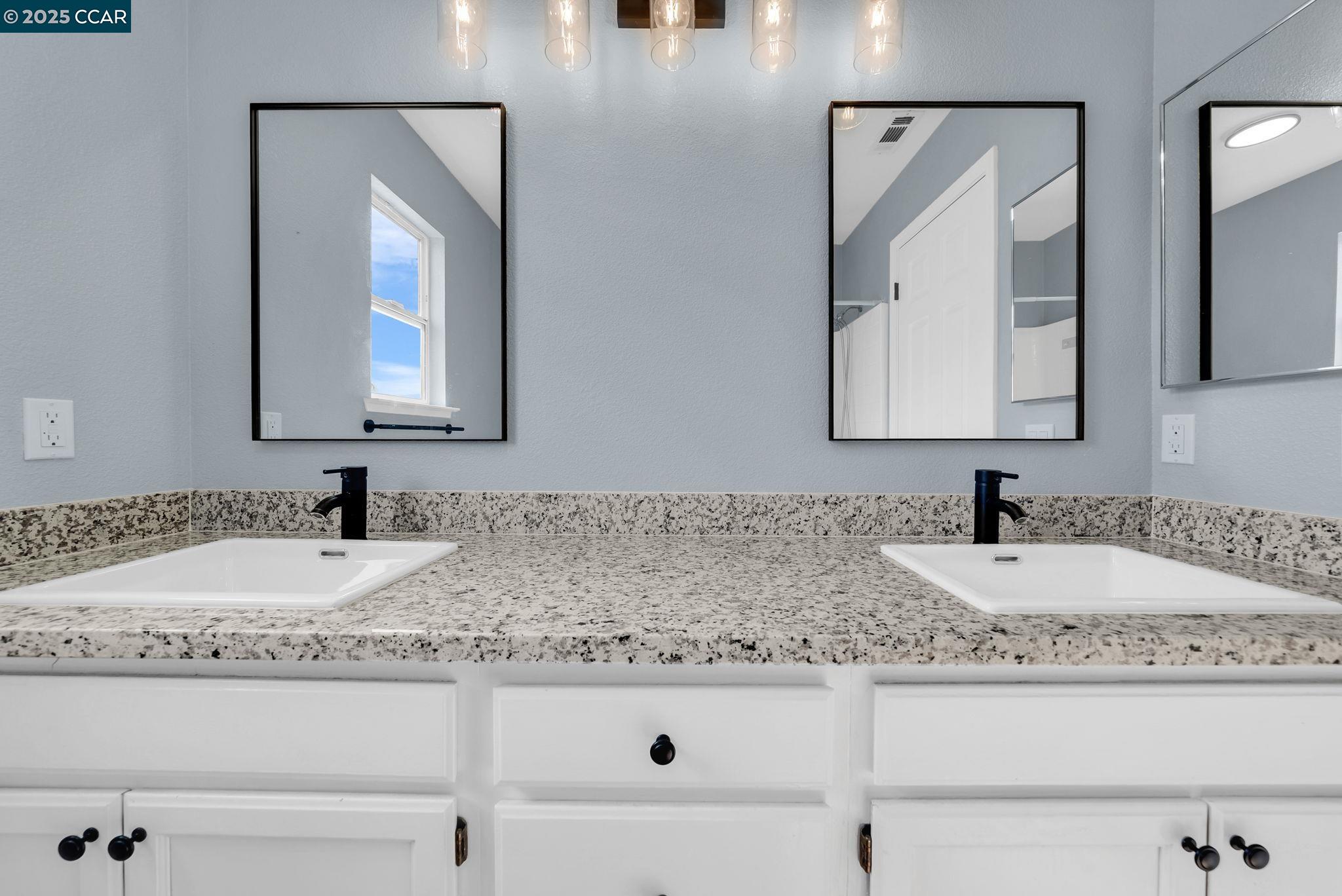 Discovery Bay Discovery Bay, CA 94505 - Photo 16 of 21 a bathroom with sink and mirror