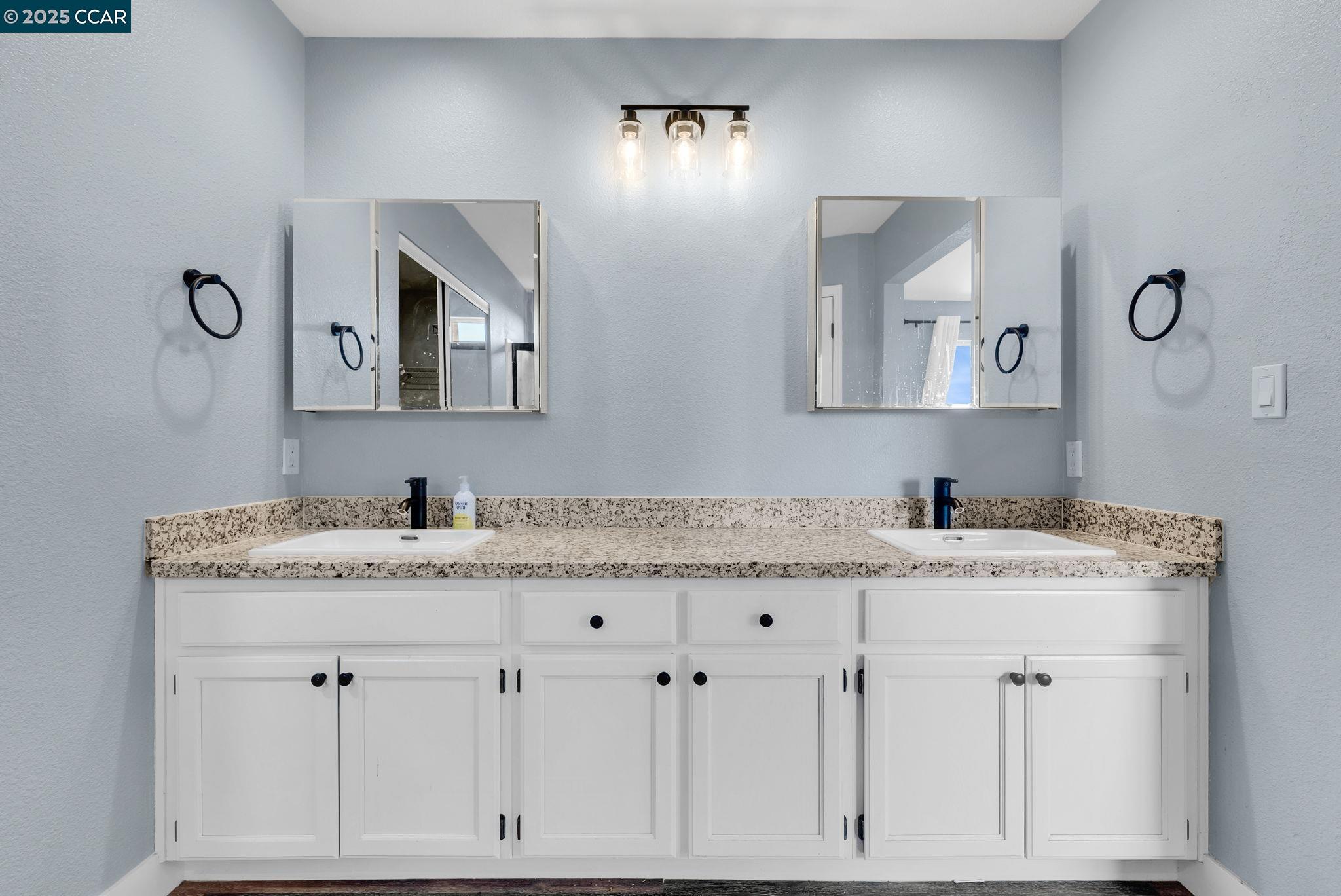 Discovery Bay Discovery Bay, CA 94505 - Photo 10 of 21 a bathroom with a granite countertop sink vanity and mirror