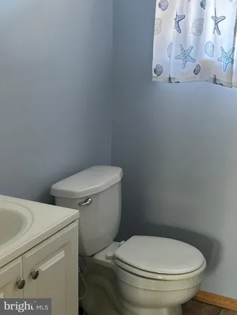 a view of a living room with furniture