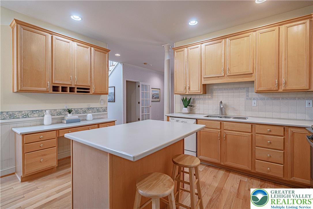 803 Dorset Road Allentown, PA 18104 - Photo 14 of 44 a kitchen with stainless steel appliances granite countertop a sink a stove a refrigerator and cabinets