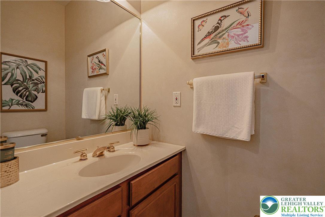 803 Dorset Road Allentown, PA 18104 - Photo 17 of 44 a bathroom with a sink and a mirror