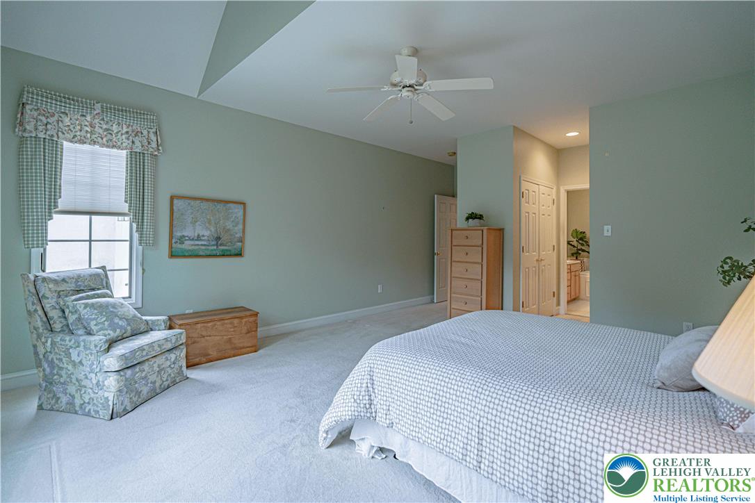 803 Dorset Road Allentown, PA 18104 - Photo 22 of 44 a bedroom with a bed and couch