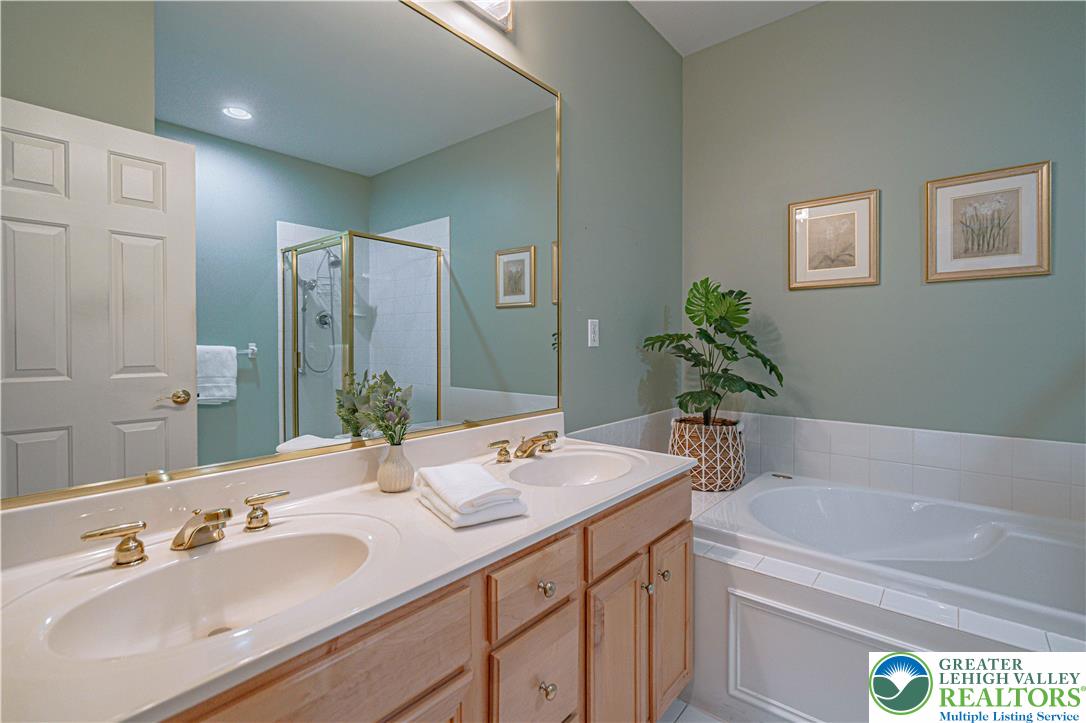 803 Dorset Road Allentown, PA 18104 - Photo 23 of 44 a bathroom with a granite countertop sink and a mirror