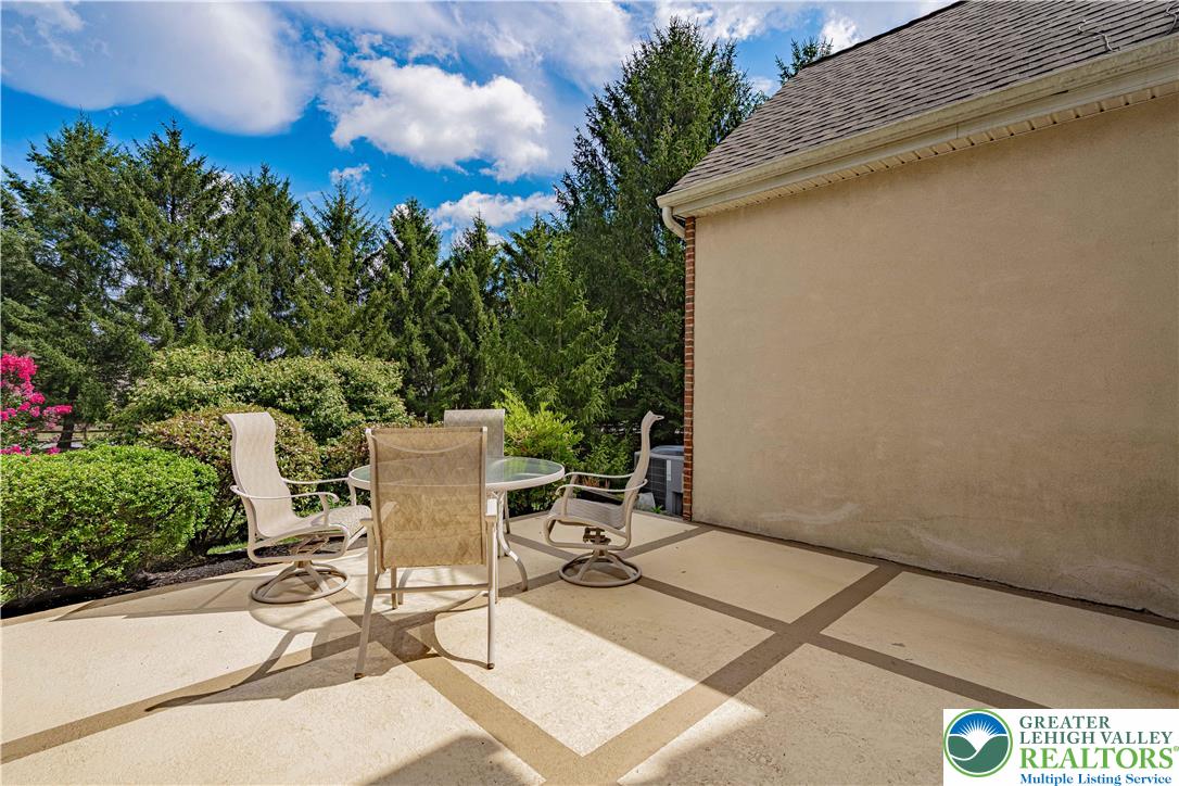 803 Dorset Road Allentown, PA 18104 - Photo 39 of 44 a view of a patio with table and chairs and potted plants