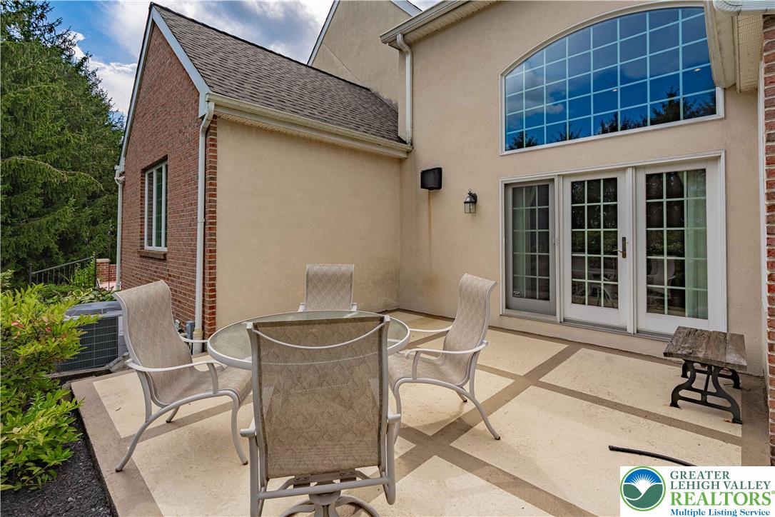 803 Dorset Road Allentown, PA 18104 - Photo 41 of 44 a view of a patio with table and chairs and potted plants