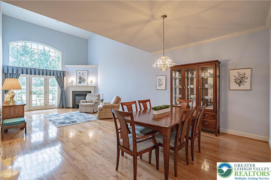 803 Dorset Road Allentown, PA 18104 - Photo 6 of 44 a view of a dining room with furniture wooden floor and a chandelier