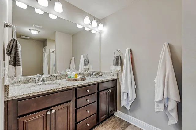 a bathroom with a shower and a toilet