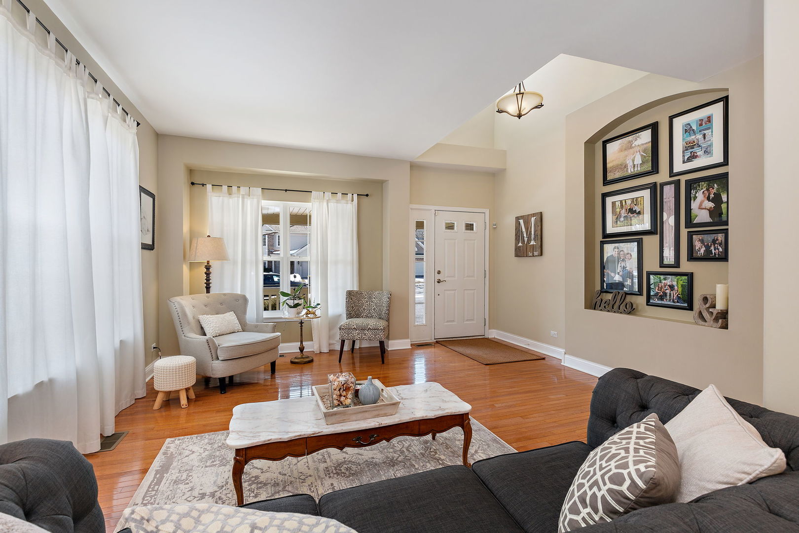 1502 Summerhill Lane Cary, IL 60013 - Photo 3 of 17 a living room with furniture rug and window