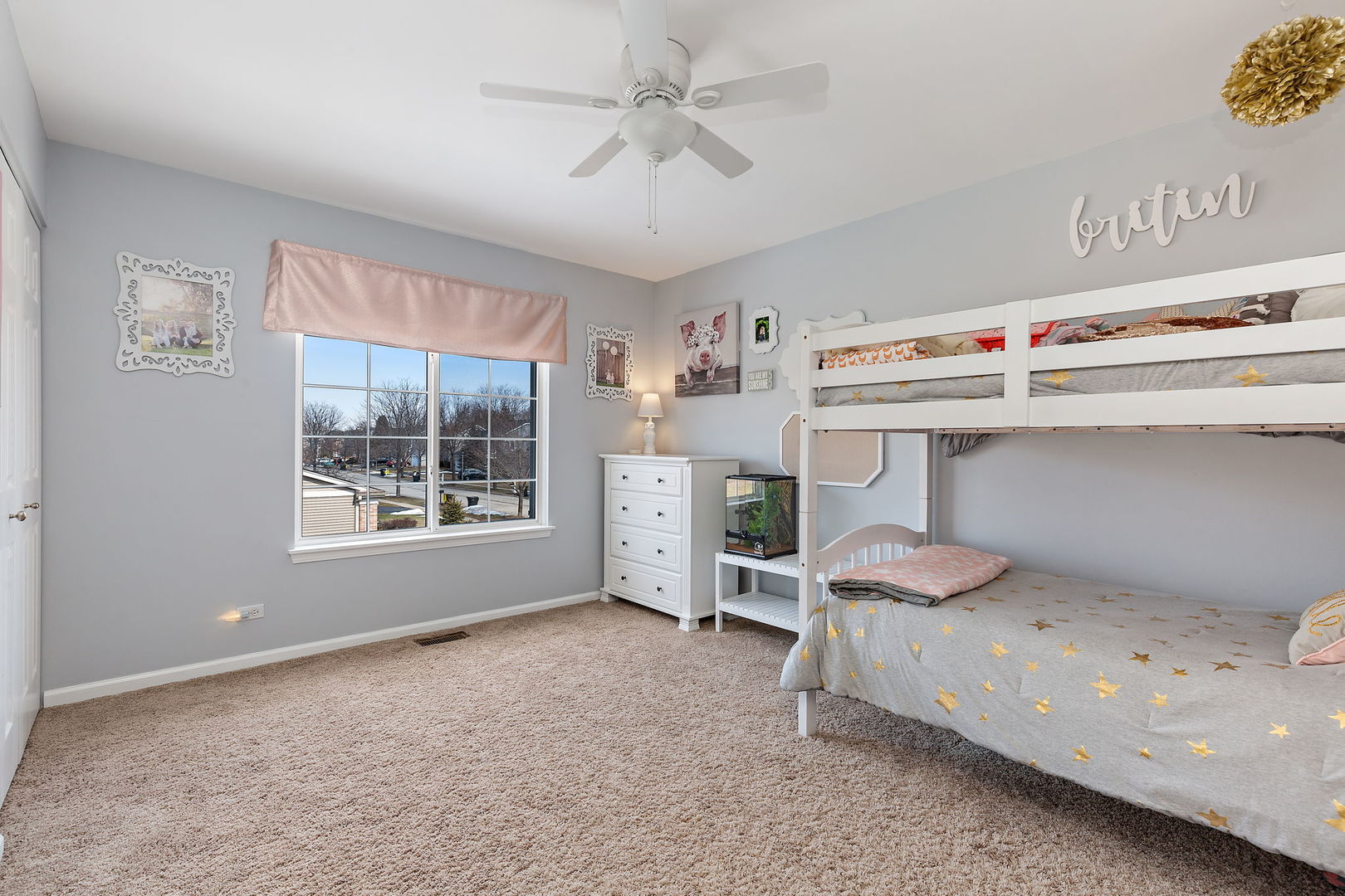 1502 Summerhill Lane Cary, IL 60013 - Photo 10 of 17 a utility room with a window fridge and ceiling fan