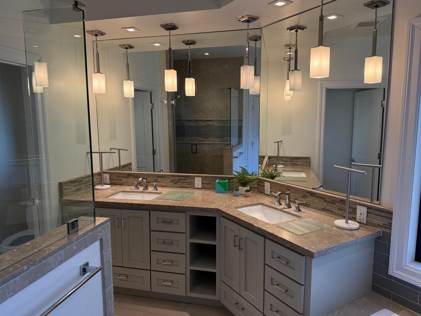 10 Fred Court Scotts Valley, CA 95066 - Photo 6 of 7 a bathroom with a granite countertop sink shower and a mirror