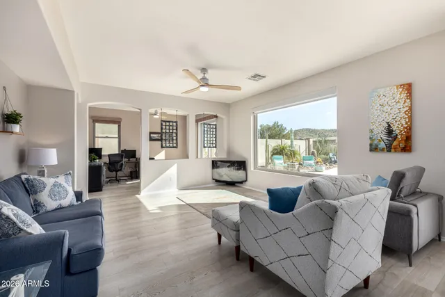 a kitchen with a refrigerator stove top oven and sink