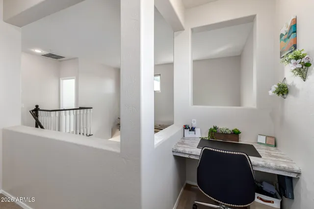 a kitchen with a stove and a refrigerator