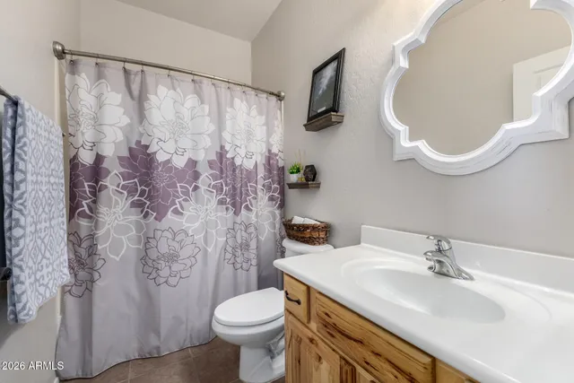 an aerial view of a house with a garden