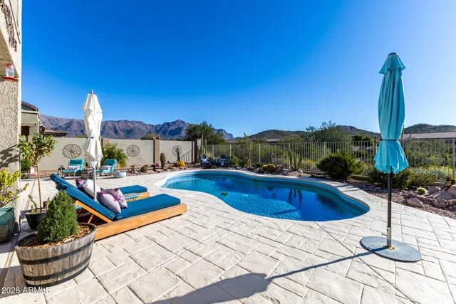 an aerial view of residential house and sandy dunes