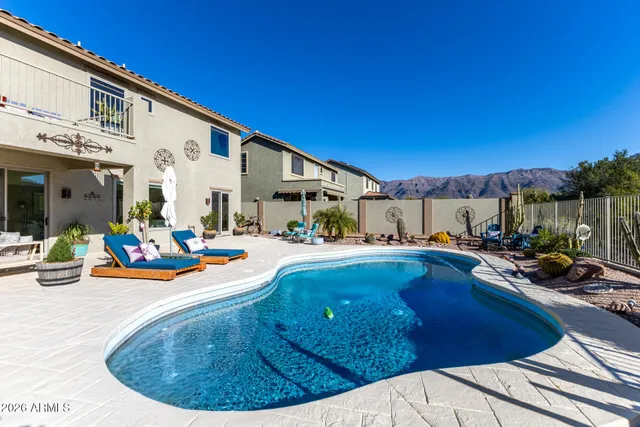 an aerial view of a house and a garden