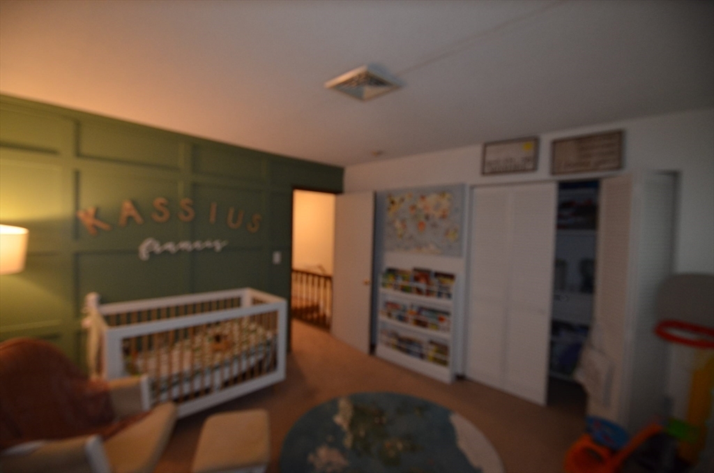 2 Rocky Nook, Unit 2 Malden, MA 02148 - Photo 21 of 27 a living room with furniture and a window
