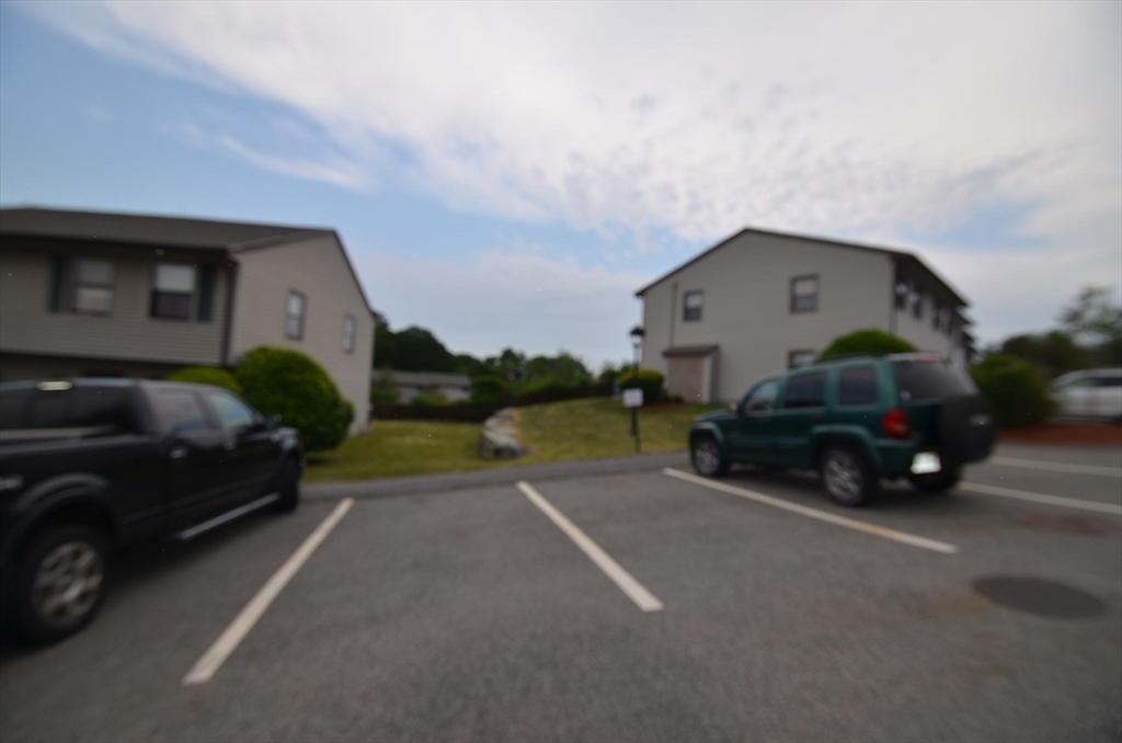 2 Rocky Nook, Unit 2 Malden, MA 02148 - Photo 22 of 27 a view of a car in back of a house
