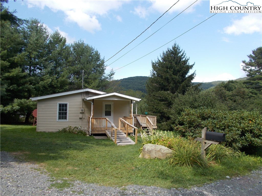 196 Boyden Road Banner Elk, NC 28604 - Photo 2 of 12 a view of a house with backyard