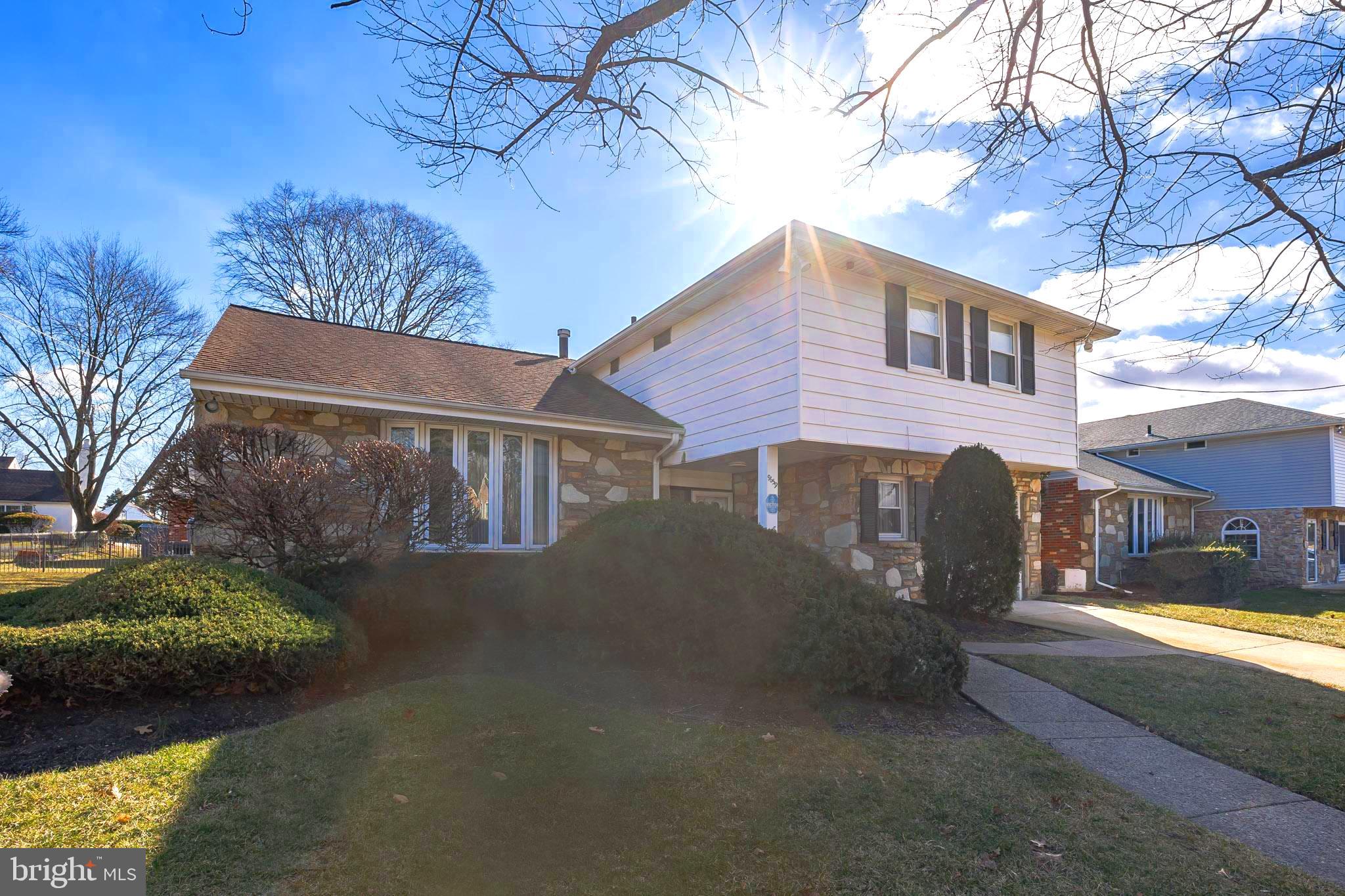 9659 Pine Road Philadelphia, PA 19115 - Photo 2 of 27 a view of a house with a yard