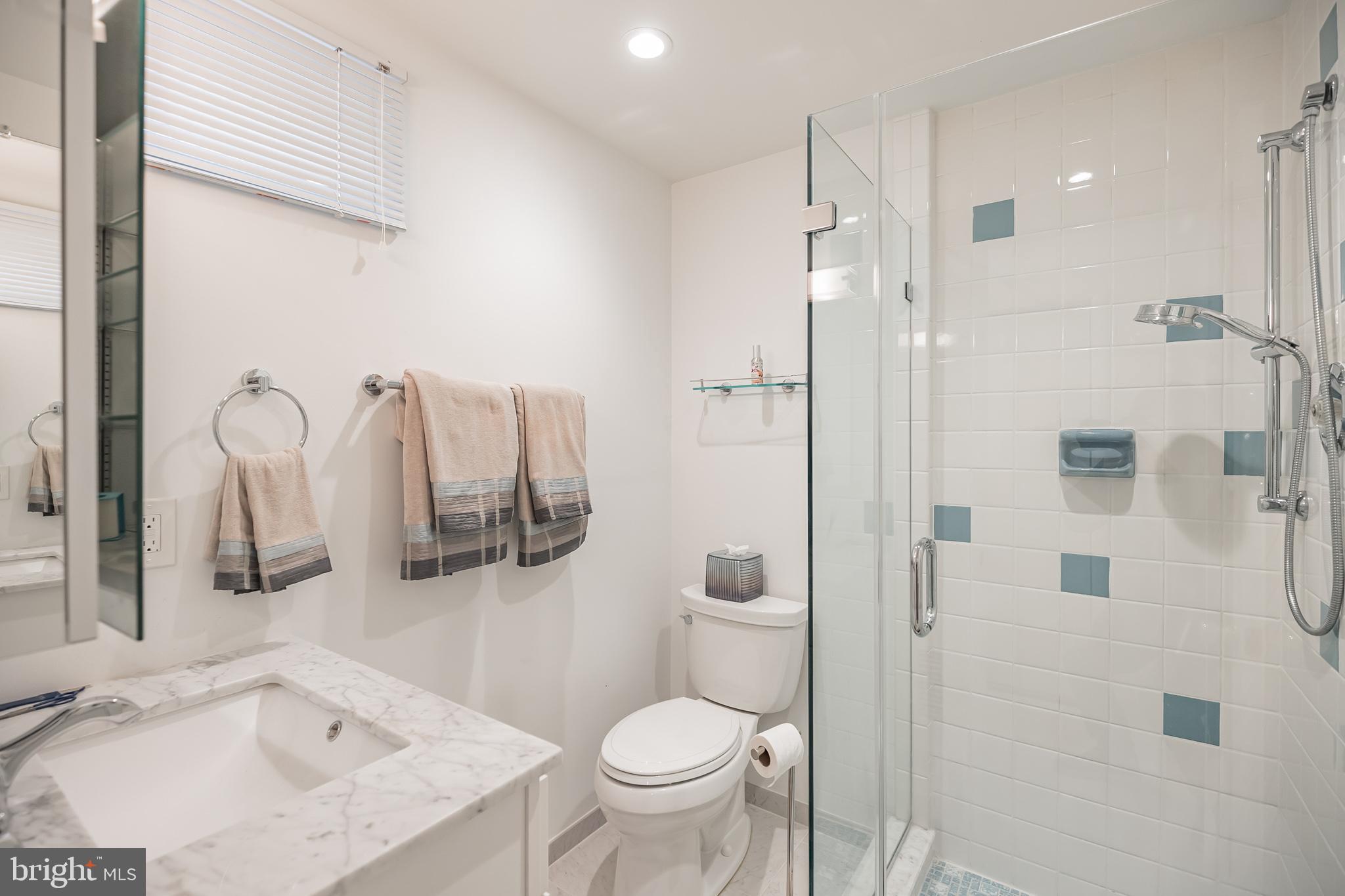 9659 Pine Road Philadelphia, PA 19115 - Photo 20 of 27 a bathroom with a sink toilet and shower