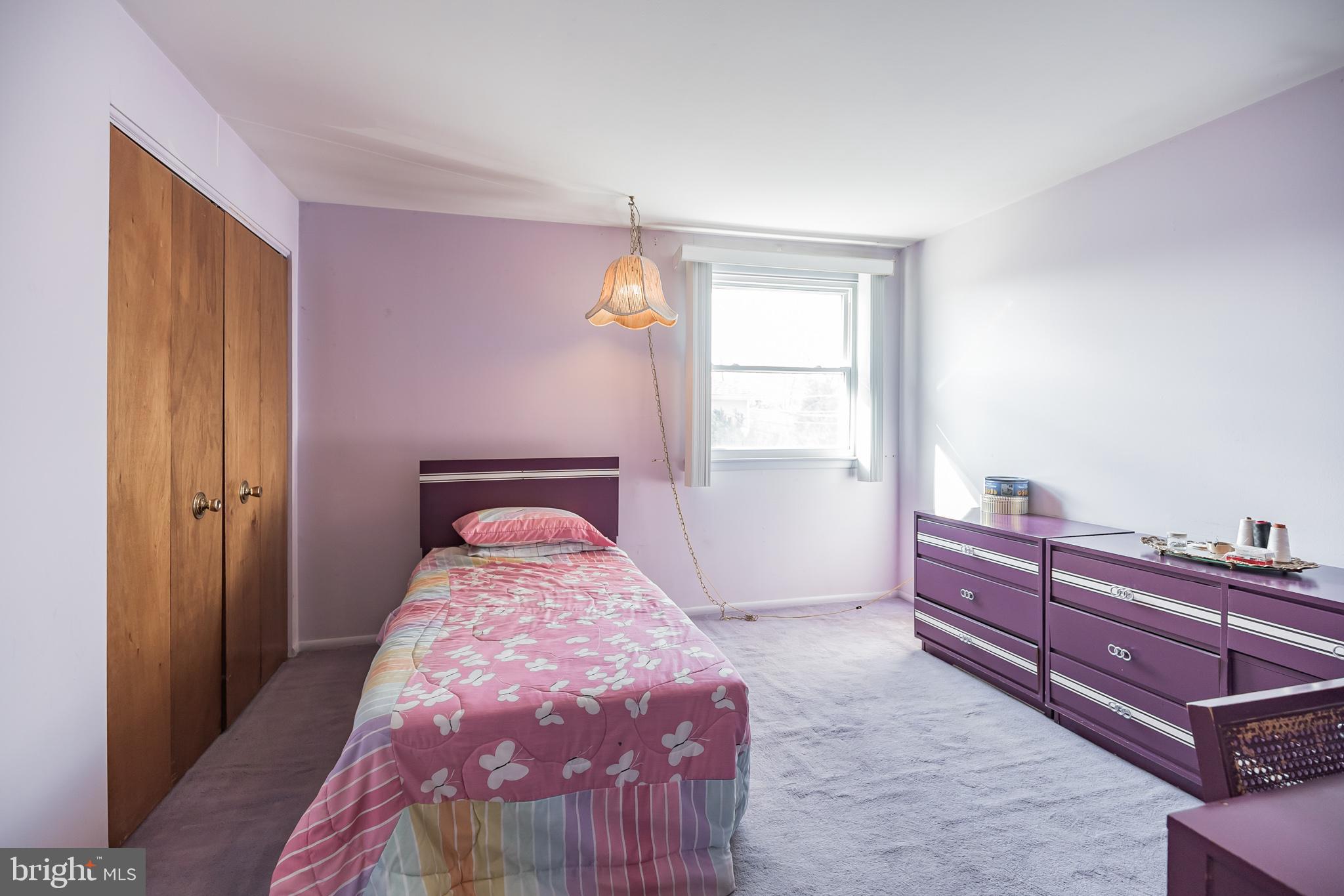 9659 Pine Road Philadelphia, PA 19115 - Photo 22 of 27 a bed room with a bed and a window
