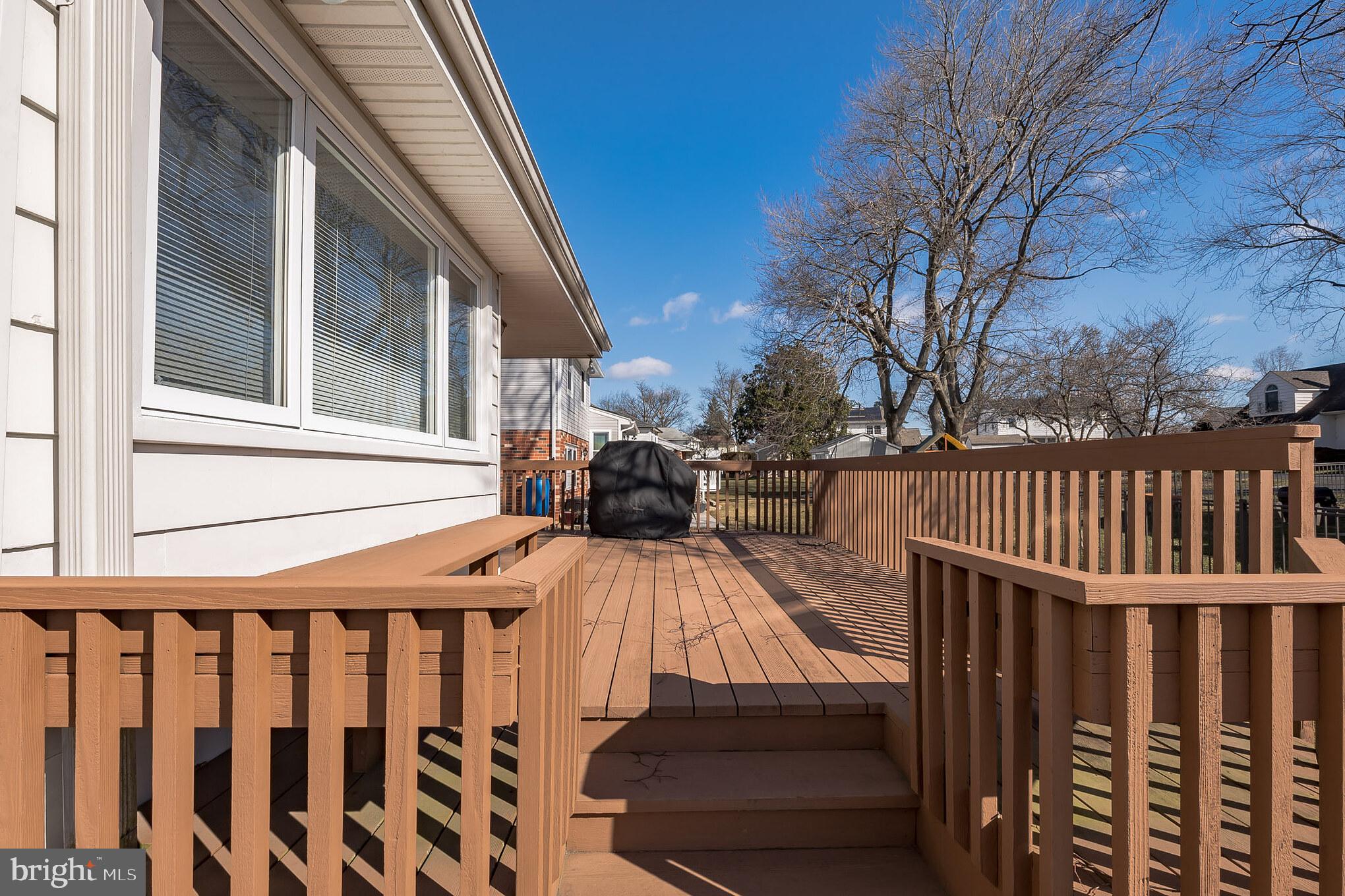 9659 Pine Road Philadelphia, PA 19115 - Photo 26 of 27 a view of a house with wooden deck