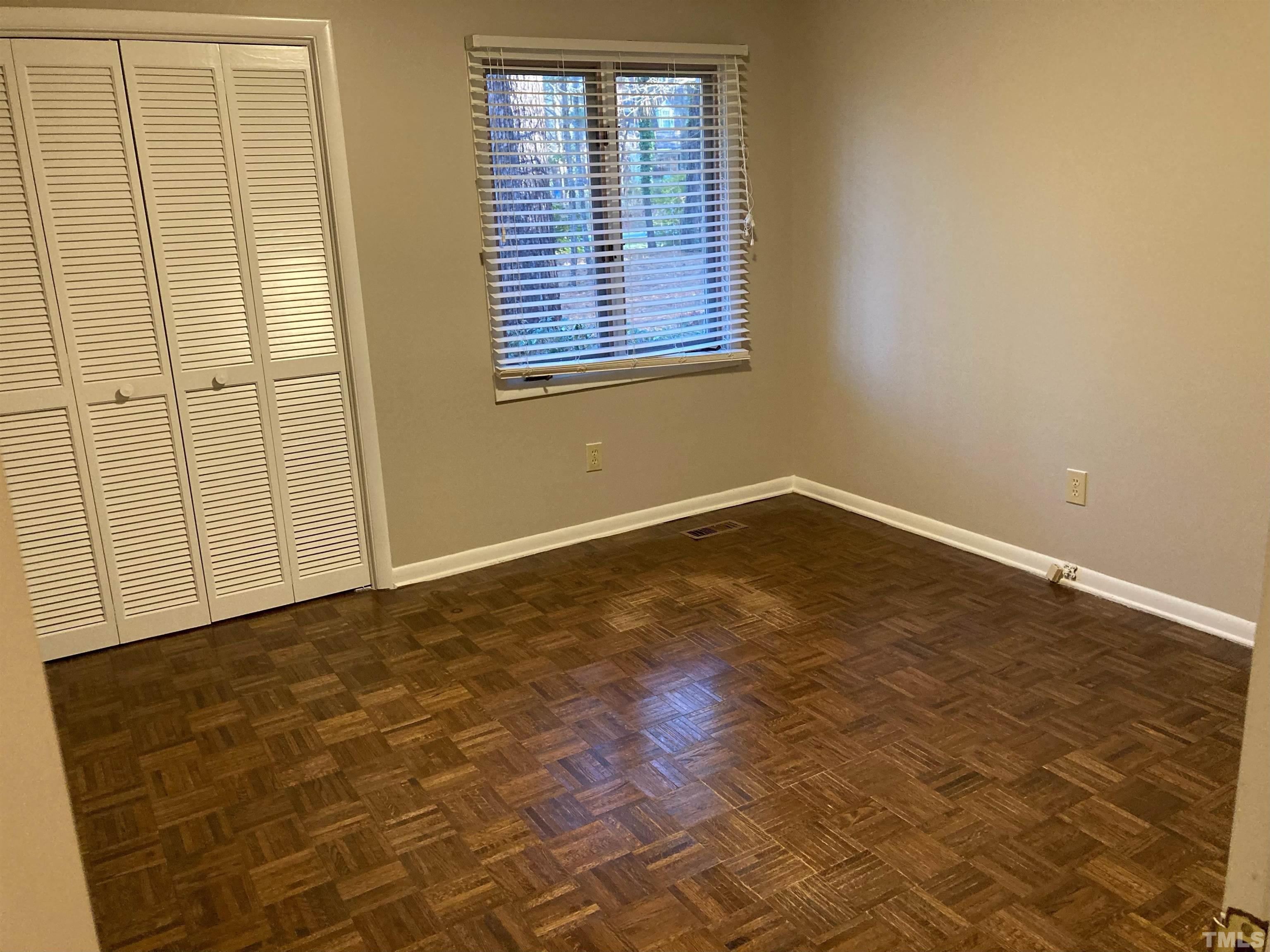 8708 Langtree Lane Raleigh, NC 27613 - Photo 13 of 21 an empty room with windows