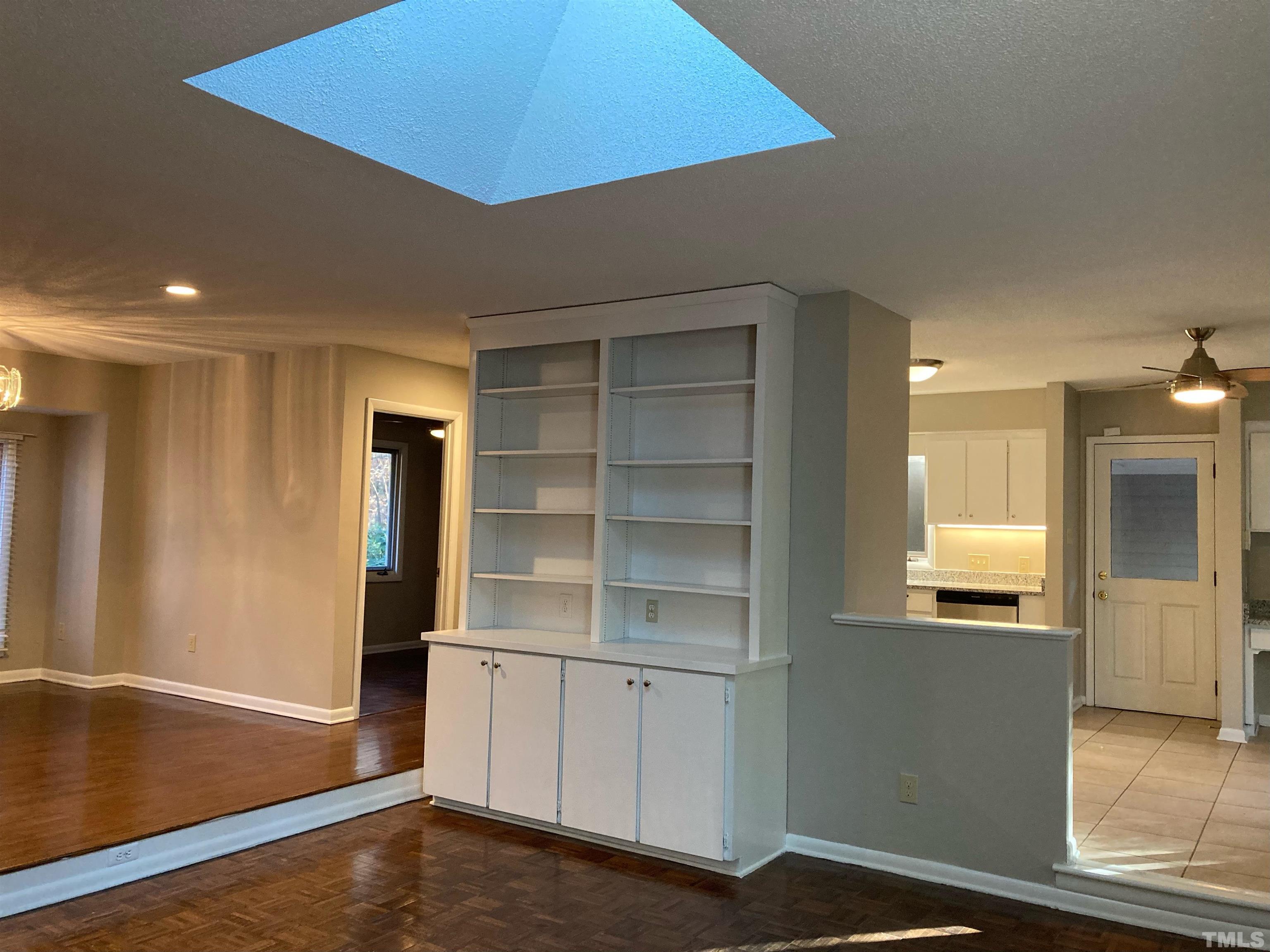 8708 Langtree Lane Raleigh, NC 27613 - Photo 20 of 21 a view of an empty room with cabinet and a window