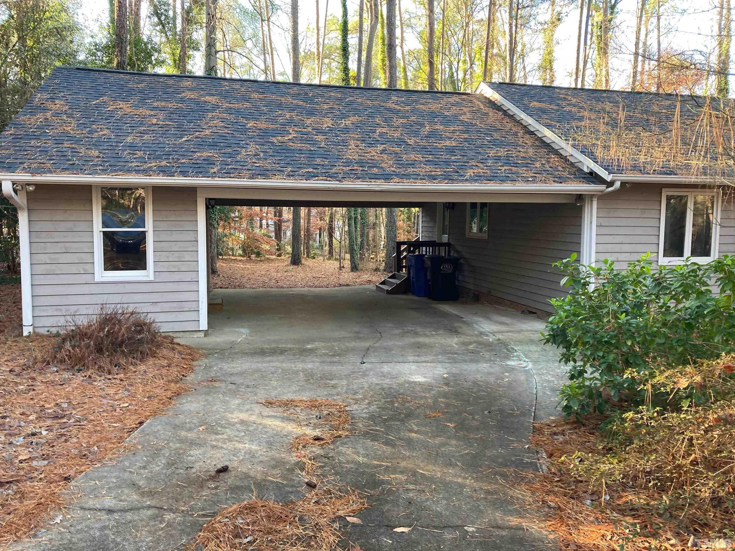 8708 Langtree Lane Raleigh, NC 27613 - Photo 4 of 21 a view of a house with a yard