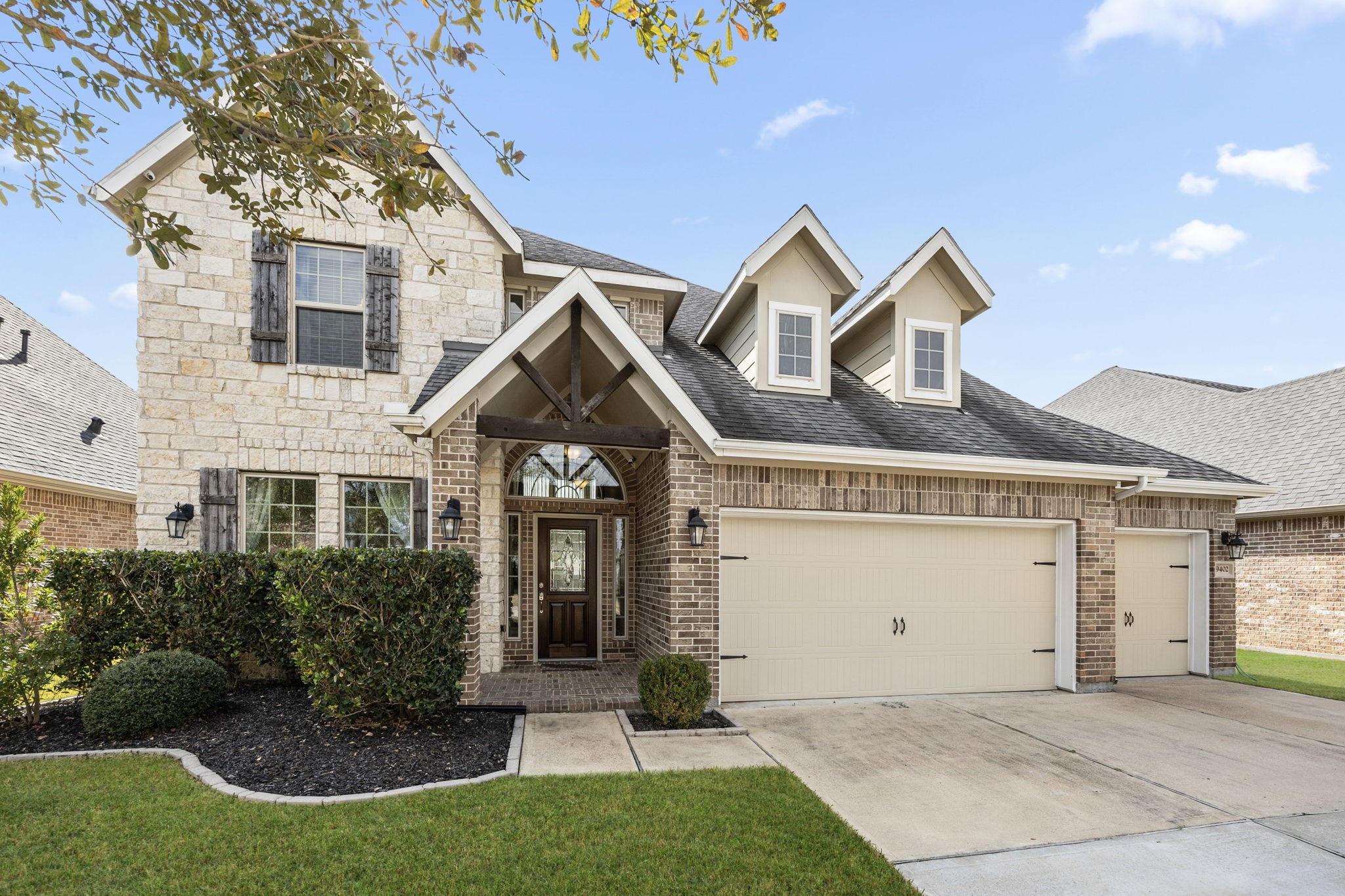 9402 Wheatfield Lane Rosenberg, TX 77469 - Photo 2 of 47 Beautiful brick and stone elevation with 3-car garage!