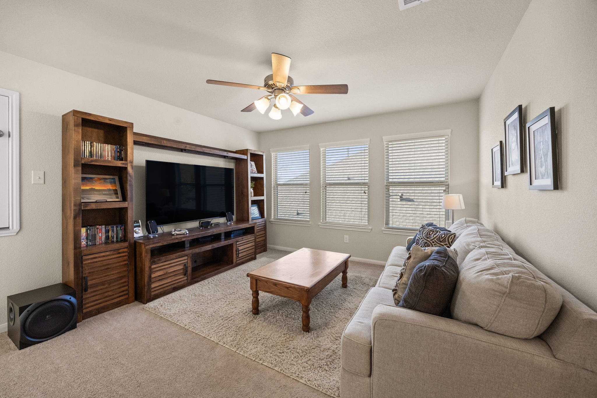 9402 Wheatfield Lane Rosenberg, TX 77469 - Photo 25 of 47 Game room upstairs provides an additional hangout space!