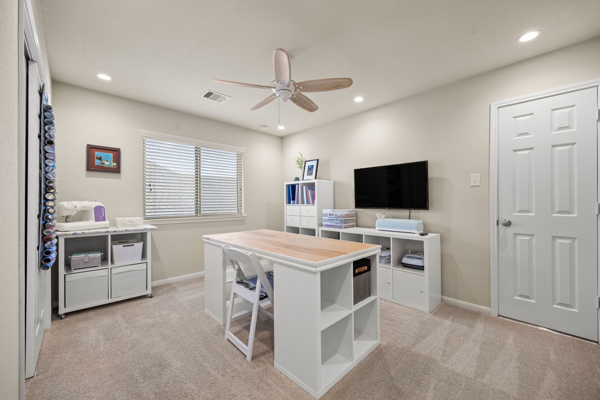 9402 Wheatfield Lane Rosenberg, TX 77469 - Photo 27 of 47 This secondary bedroom, currently being used as a craft room, features an en-suite bathroom!