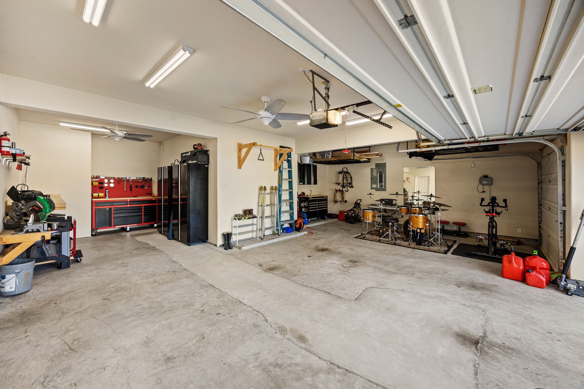 9402 Wheatfield Lane Rosenberg, TX 77469 - Photo 37 of 47 Oversized, 3-car garage with room for a workshop!