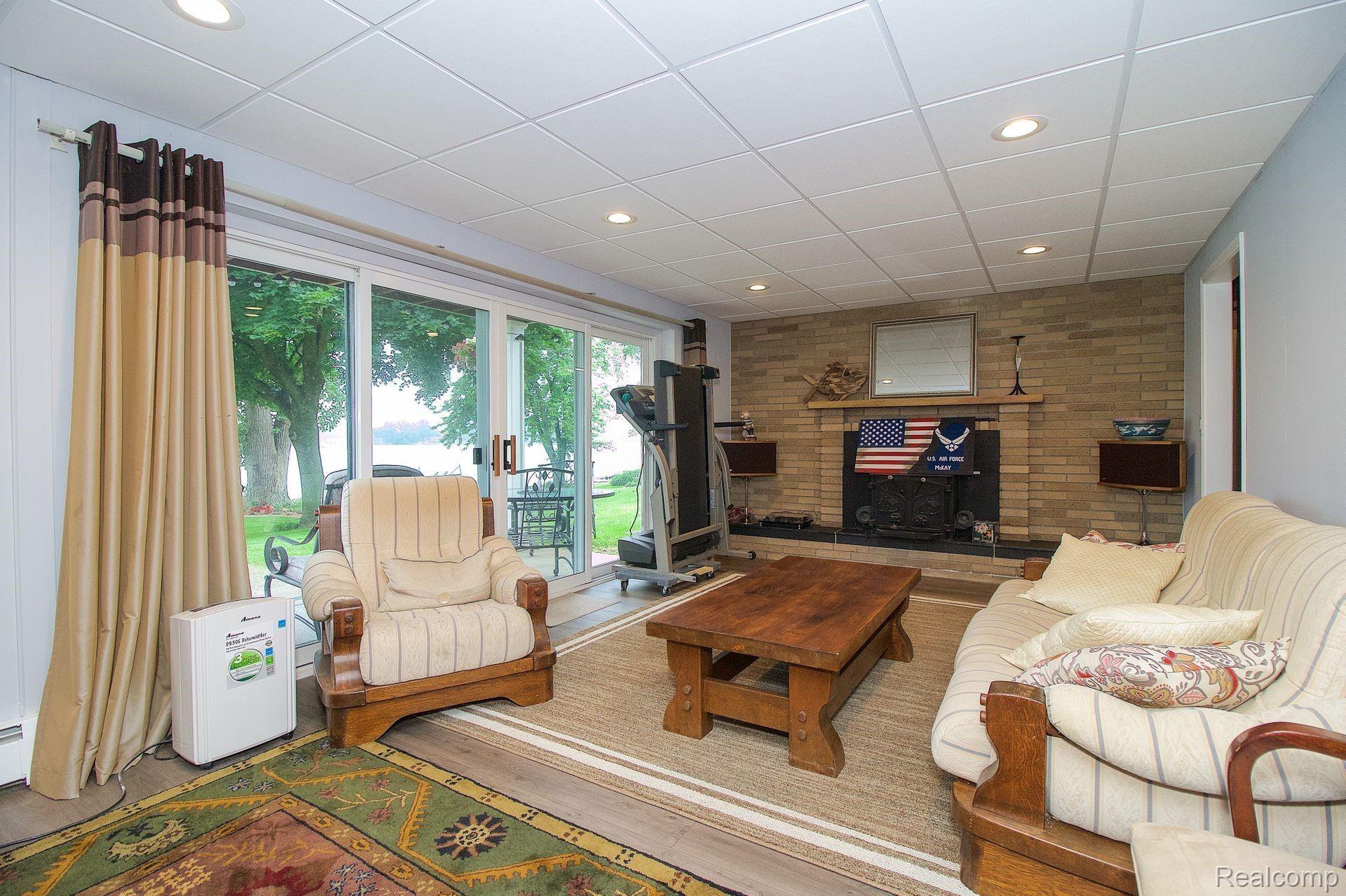3379 East Rolston Road Fenton, MI 48430 - Photo 21 of 31 Family Room with brick fireplace