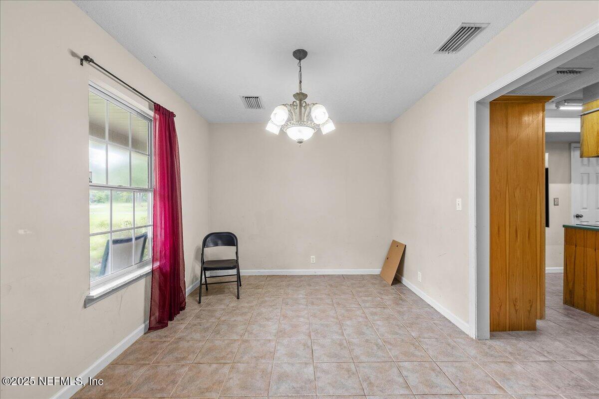 55056 Yellow Jacket Drive Callahan, FL 32011 - Photo 10 of 31 a view of a livingroom with a window
