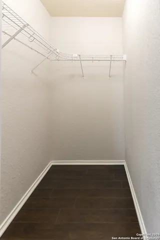 a view of a room with racks on the wall