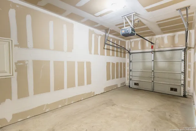 a view of an empty room with stairs