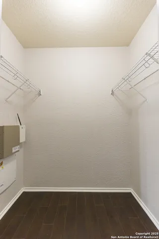 a view of small space with racks on the wall