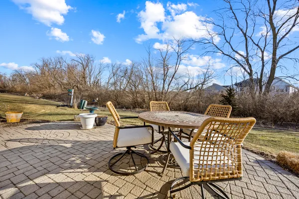 a view of a patio with a yard