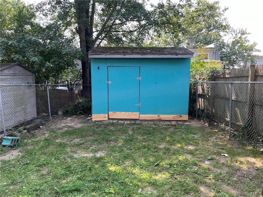 38 Hampton Court Middletown, NY 10941 - Photo 15 of 17 View of outdoor structure featuring a yard