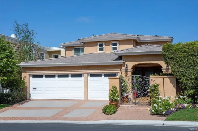 an aerial view of a house with a garden