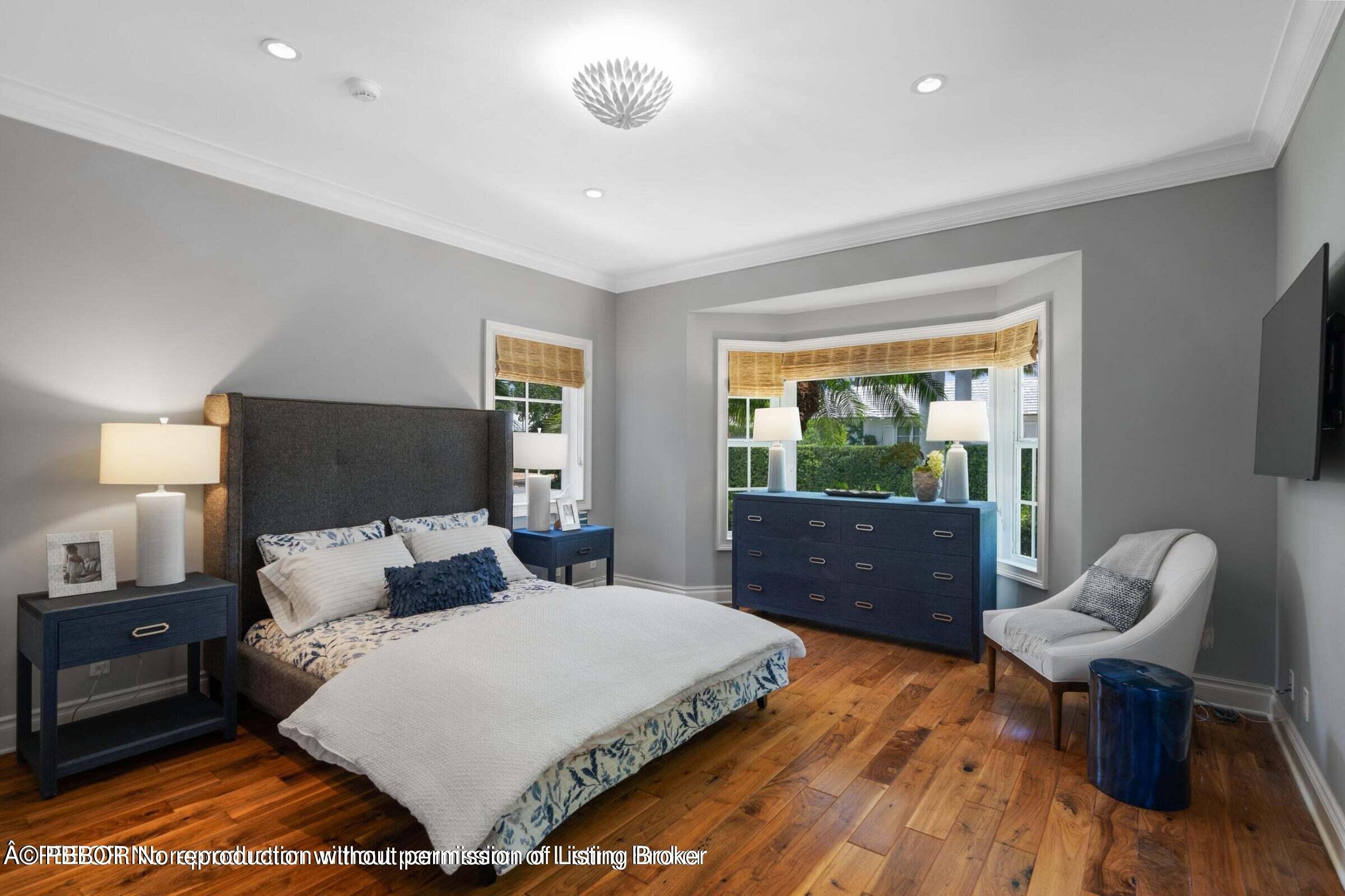 265 List Road Palm Beach, FL 33480 - Photo 12 of 21 a bedroom with a bed and a chair