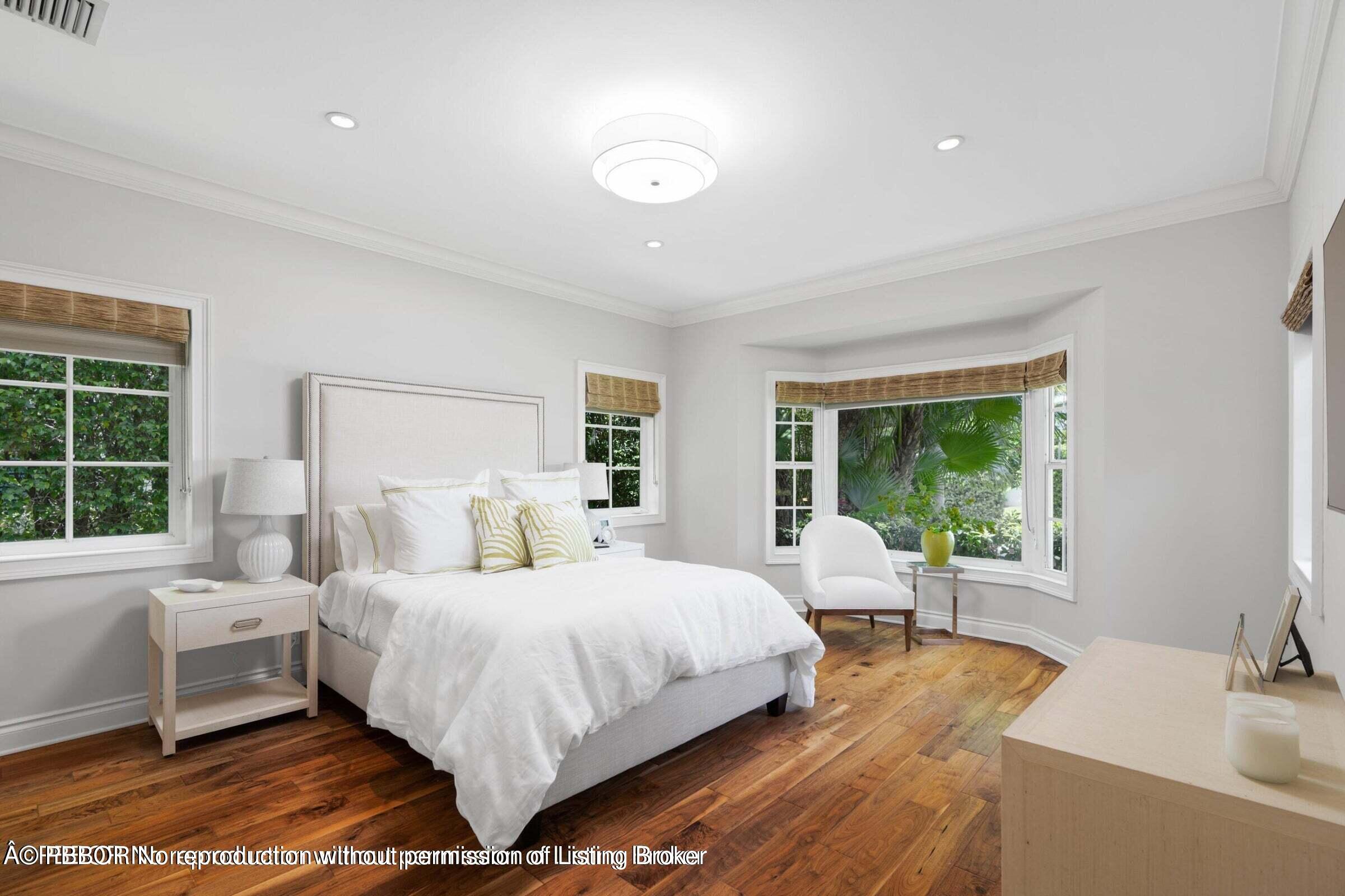 265 List Road Palm Beach, FL 33480 - Photo 14 of 21 a bedroom with a bed and a large window