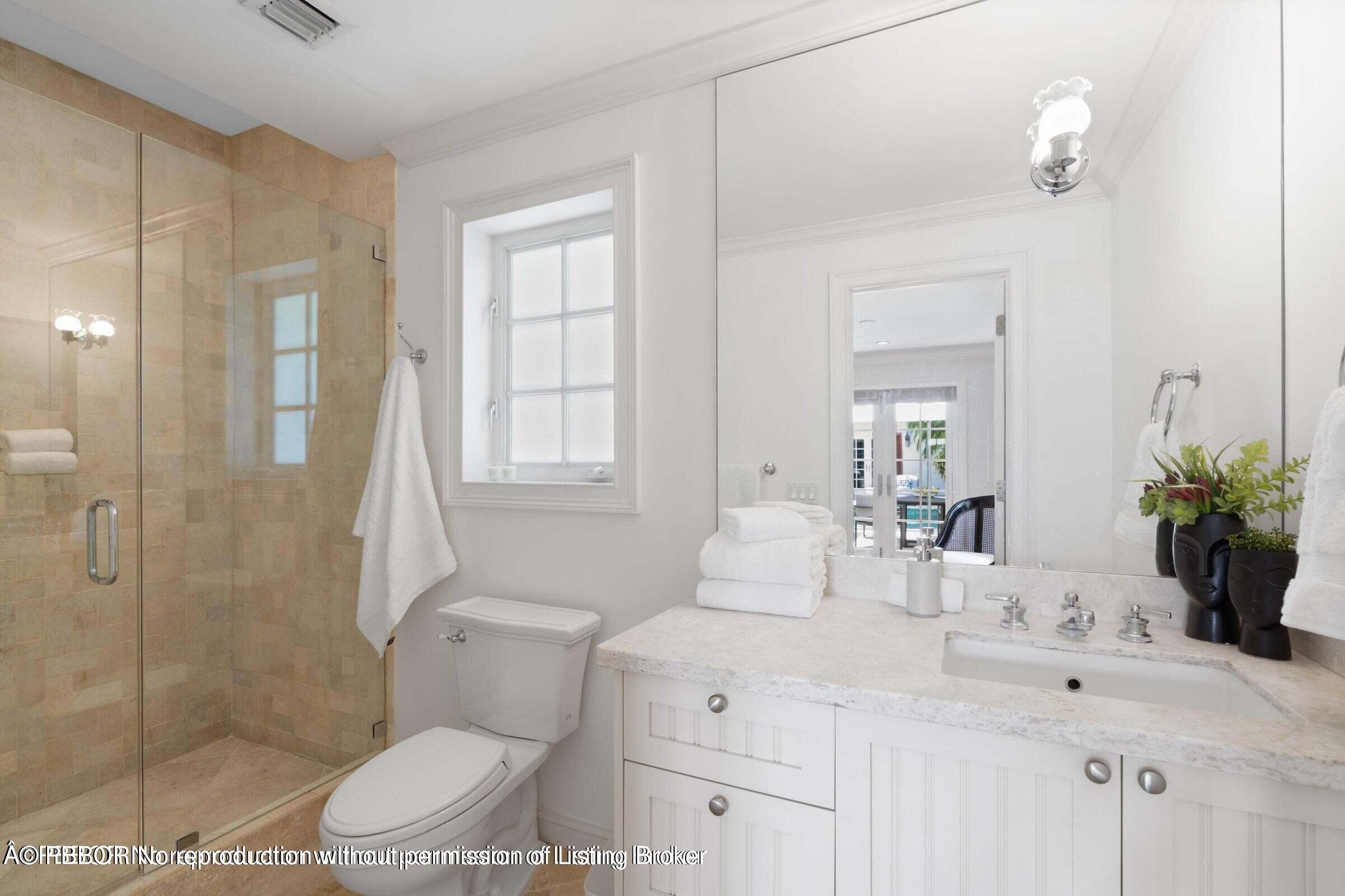 265 List Road Palm Beach, FL 33480 - Photo 15 of 21 a bathroom with a sink toilet and shower
