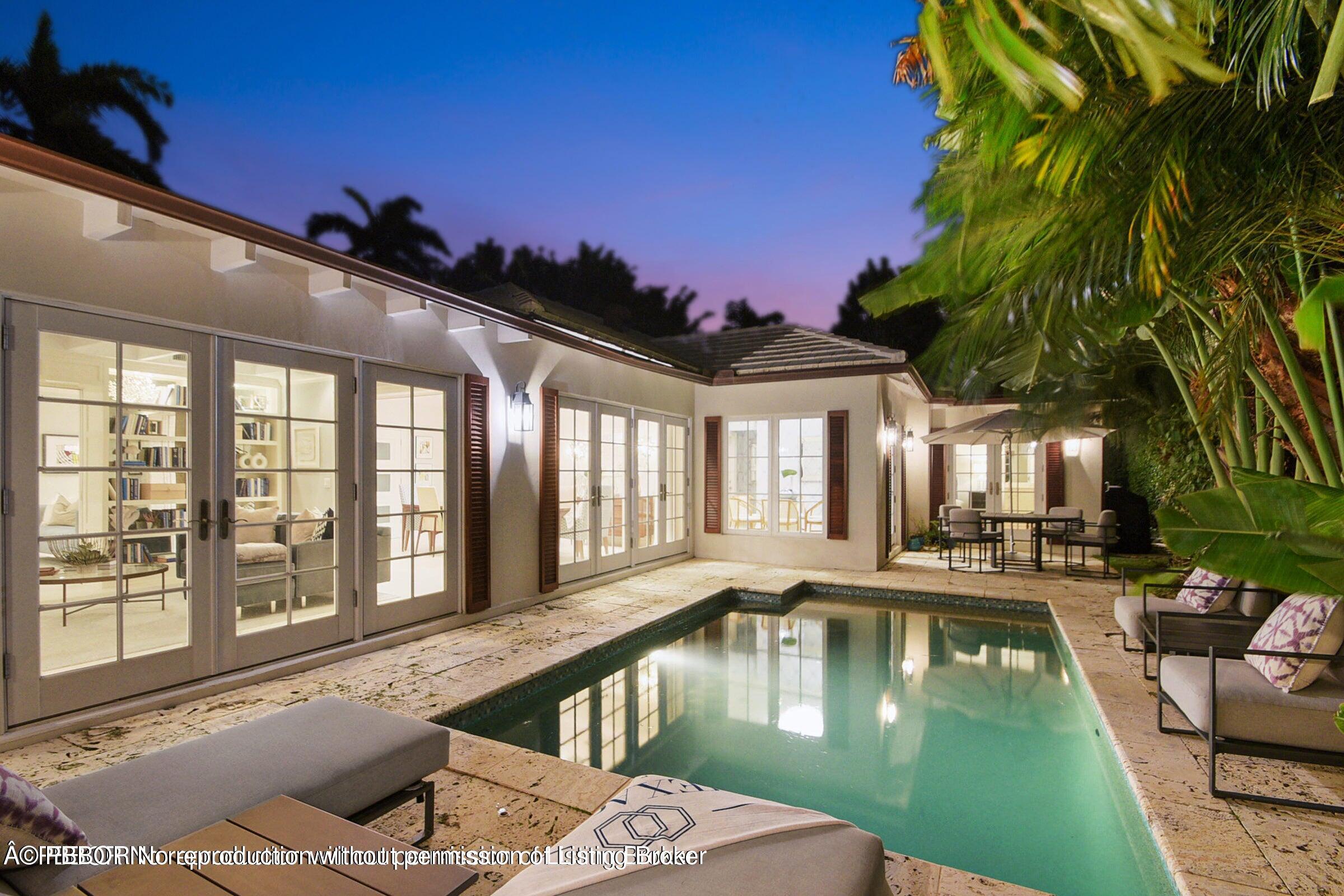265 List Road Palm Beach, FL 33480 - Photo 19 of 21 a swimming pool with outdoor seating and yard