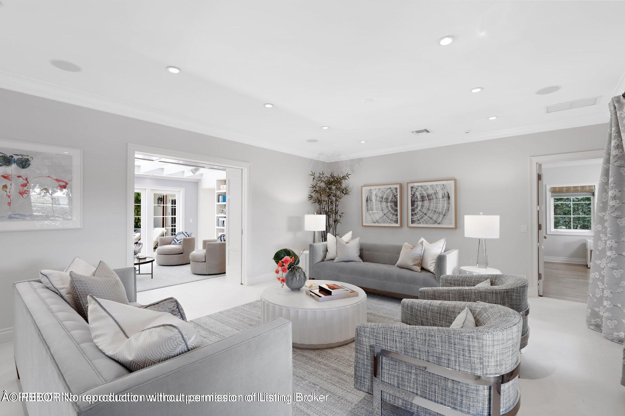 265 List Road Palm Beach, FL 33480 - Photo 4 of 21 a living room with furniture and a wooden floor