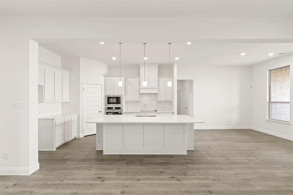 6805 Lancashire Way Forney, TX 75126 - Photo 13 of 28 13. 6805 Lancashire - Kitchen